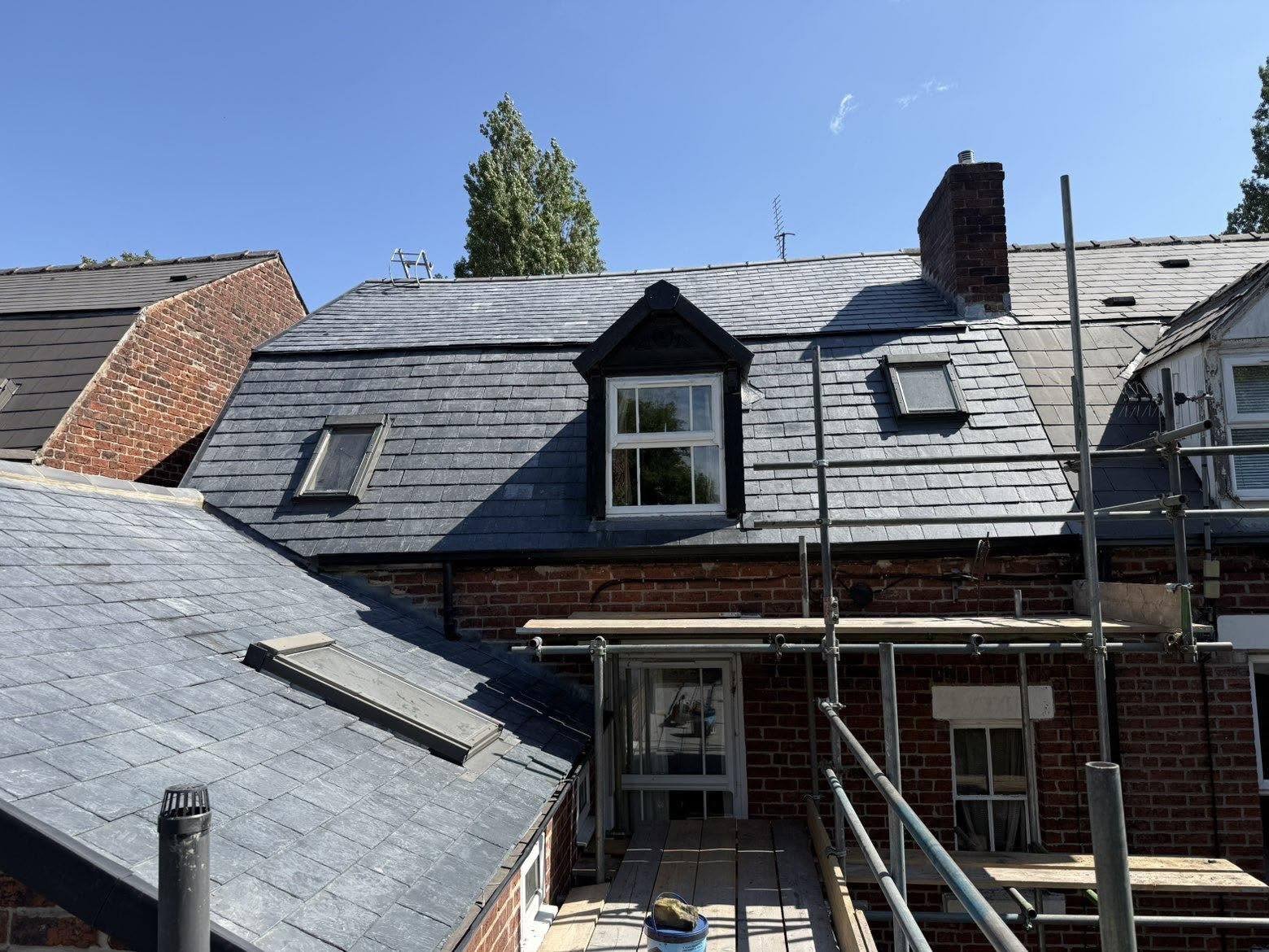 Roof work on a terraced house by ML Roofing and Building